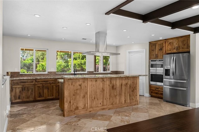 201 Valley View Dr, Oroville, CA 95966 - kitchen with stainless steel appliances, island range hood, stone countertops, a kitchen island, and recessed lighting