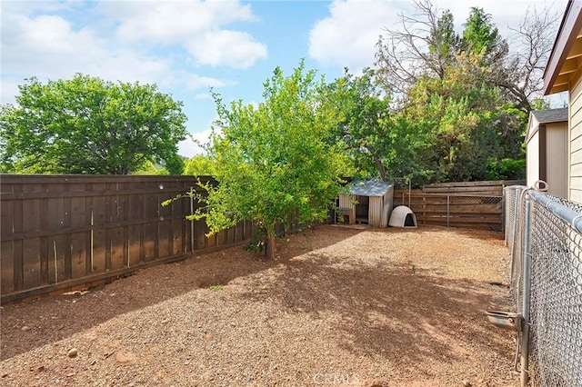 201 Valley View Dr, Oroville, CA 95966 - fenced backyard with an outbuilding and a storage unit