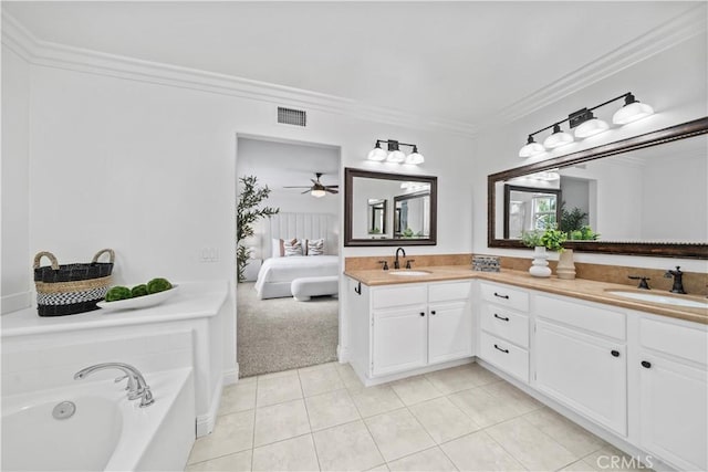 50 Bluff Cove Dr, Aliso Viejo, CA 92656 - full bathroom featuring double vanity, ensuite bath, tile patterned floors, crown molding, and a bath