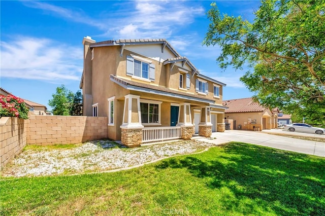 craftsman house with a porch, driveway, stucco siding, and a garage