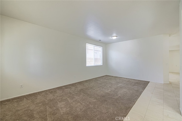 43839 58th St W, Lancaster, CA 93536 - spare room with light tile patterned flooring