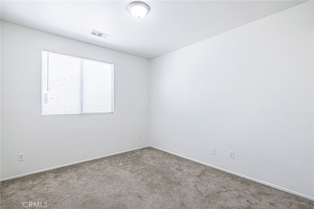 43839 58th St W, Lancaster, CA 93536 - empty room featuring carpet and baseboards