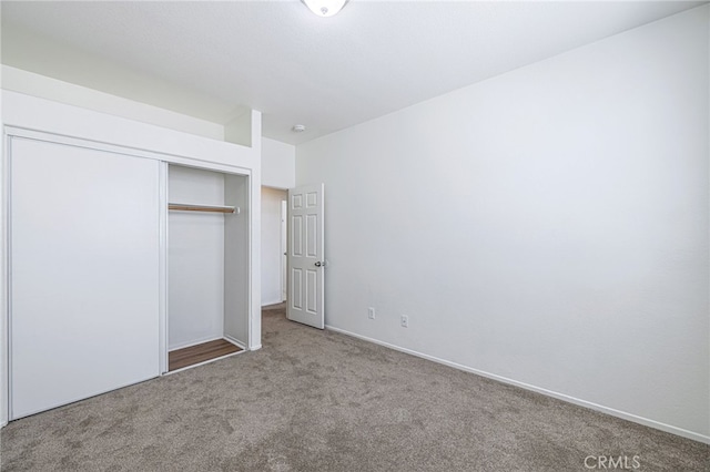 43839 58th St W, Lancaster, CA 93536 - unfurnished bedroom featuring carpet flooring, a closet, and baseboards