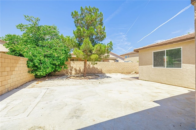 43839 58th St W, Lancaster, CA 93536 - fenced backyard with a patio area