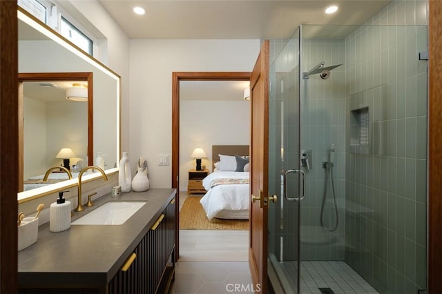 2136 Echo Park Ave, Los Angeles, CA 90026 - ensuite bathroom with a shower stall, recessed lighting, tile patterned floors, and vanity