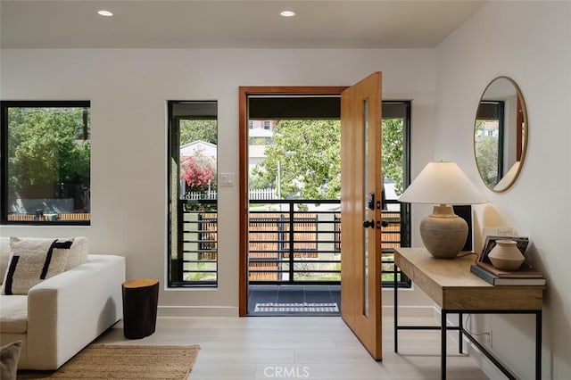 2136 Echo Park Ave, Los Angeles, CA 90026 - doorway featuring wood finished floors, recessed lighting, baseboards, and plenty of natural light