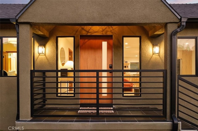 2136 Echo Park Ave, Los Angeles, CA 90026 - doorway to property with roof with shingles, stucco siding, and a porch