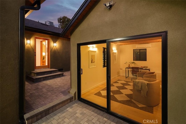 2136 Echo Park Ave, Los Angeles, CA 90026 - exterior entry at dusk featuring stucco siding