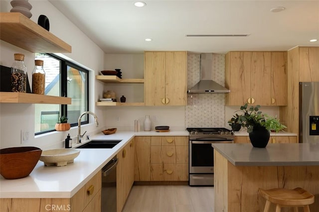 2136 Echo Park Ave, Los Angeles, CA 90026 - kitchen with wall chimney range hood, a sink, appliances with stainless steel finishes, open shelves, and light brown cabinets