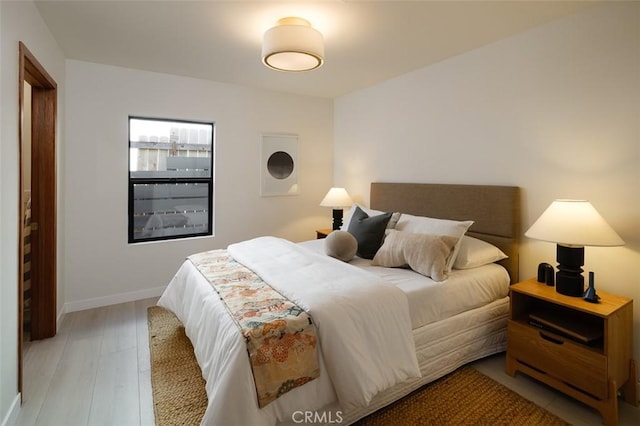 2136 Echo Park Ave, Los Angeles, CA 90026 - bedroom featuring light wood-type flooring and baseboards