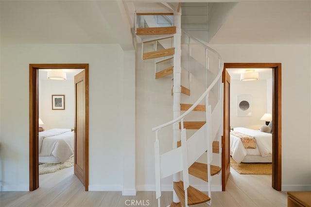 2136 Echo Park Ave, Los Angeles, CA 90026 - staircase featuring wood finished floors and baseboards