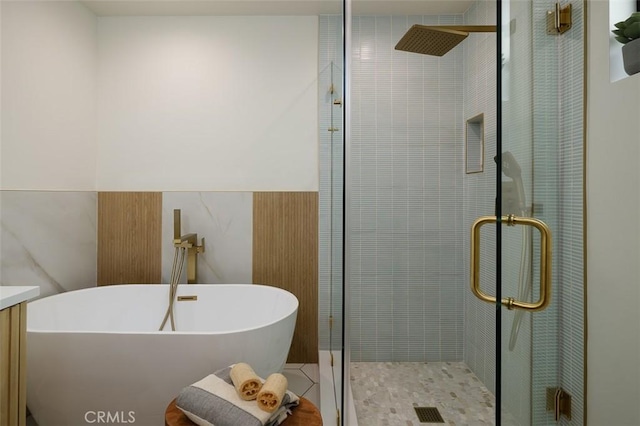 2136 Echo Park Ave, Los Angeles, CA 90026 - bathroom with a shower stall, a freestanding tub, vanity, and tile patterned flooring