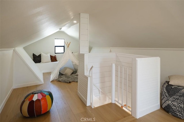 2136 Echo Park Ave, Los Angeles, CA 90026 - bedroom featuring vaulted ceiling, wood finished floors, and baseboards