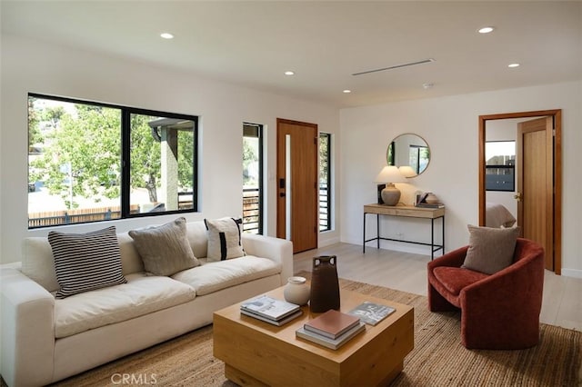 2136 Echo Park Ave, Los Angeles, CA 90026 - living area featuring recessed lighting, plenty of natural light, and light wood-style flooring