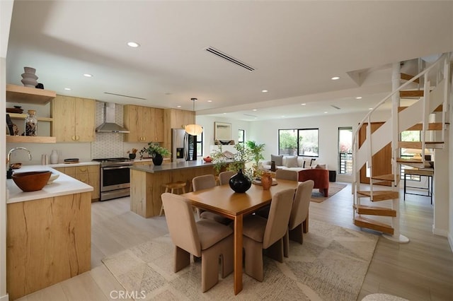2136 Echo Park Ave, Los Angeles, CA 90026 - dining room featuring stairway, recessed lighting, and light wood finished floors