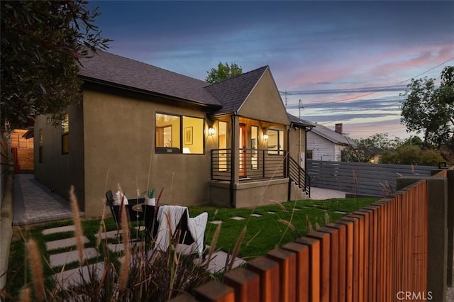 2136 Echo Park Ave, Los Angeles, CA 90026 - view of front facade with stucco siding and a shingled roof