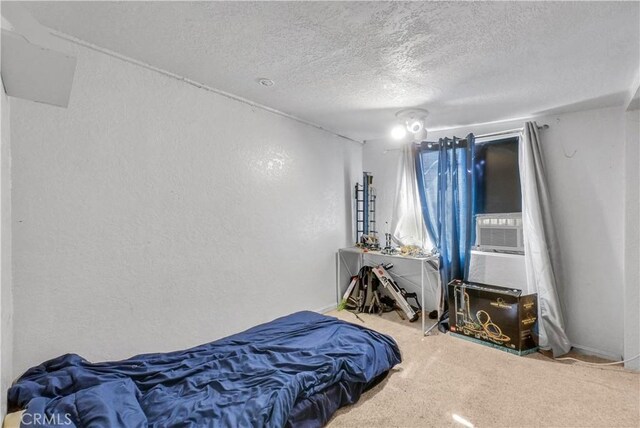 9446 La Grande St, Rancho Cucamonga, CA 91701 - carpeted bedroom with a textured ceiling, a textured wall, and baseboards