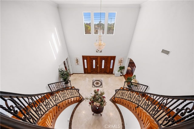 1621 Bryan Ave, Tustin, CA 92780 - tiled entryway featuring ornamental molding and a towering ceiling
