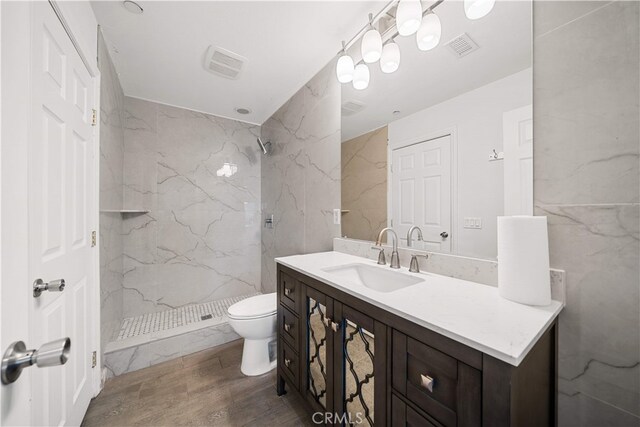 1621 Bryan Ave, Tustin, CA 92780 - full bath with toilet, a marble finish shower, vanity, and wood finished floors