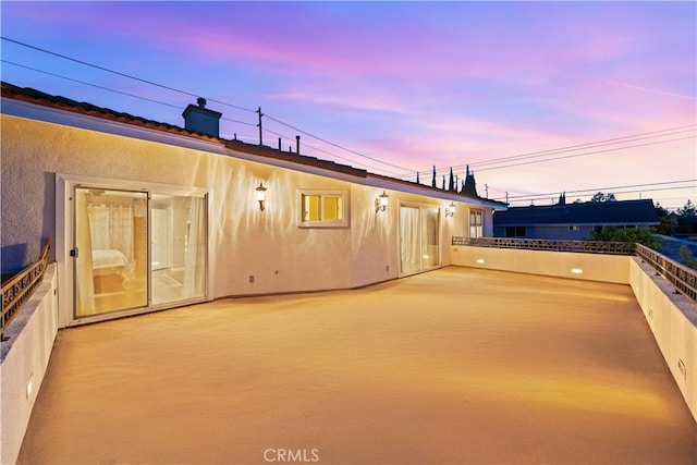 1621 Bryan Ave, Tustin, CA 92780 - patio terrace at dusk featuring a balcony