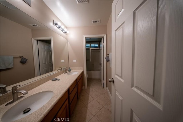 35197 Hogan Dr, Beaumont, CA 92223 - bathroom with double vanity, tile patterned floors, and toilet