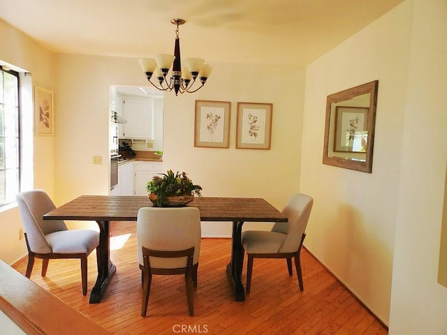 820 Rainwater Ln, Walnut, CA 91789 - dining space with light wood-style floors and a chandelier