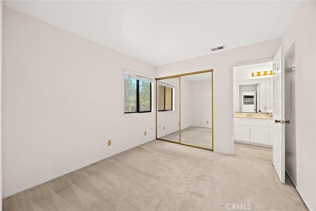 820 Rainwater Ln, Walnut, CA 91789 - unfurnished bedroom featuring light colored carpet, a closet, and ensuite bath