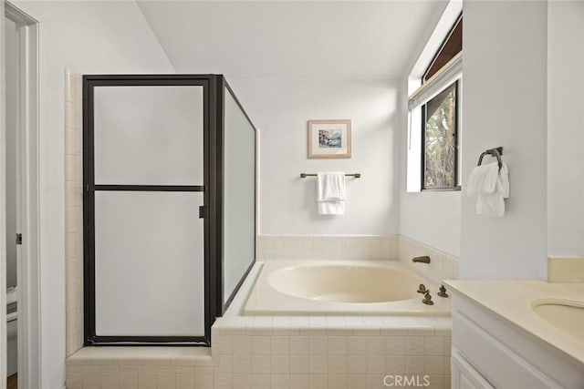 820 Rainwater Ln, Walnut, CA 91789 - full bathroom featuring a garden tub, vanity, a stall shower, and toilet