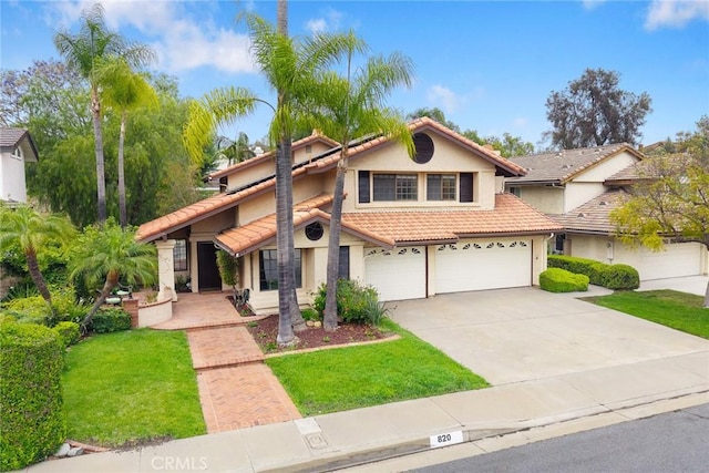820 Rainwater Ln, Walnut, CA 91789 - view of front of home with a tiled roof, stucco siding, driveway, and a front yard
