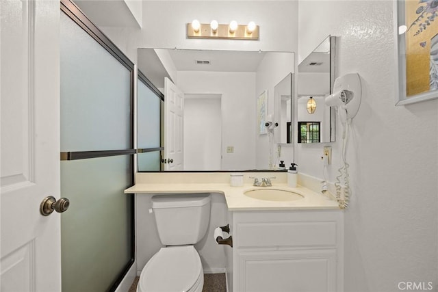 820 Rainwater Ln, Walnut, CA 91789 - bathroom featuring toilet, vanity, and a textured wall