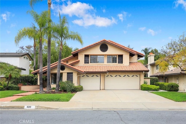 820 Rainwater Ln, Walnut, CA 91789 - view of front of home with a tiled roof, stucco siding, a garage, and driveway