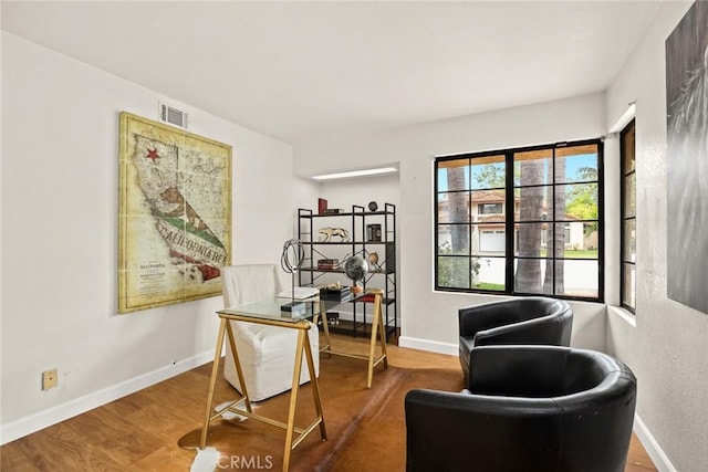 820 Rainwater Ln, Walnut, CA 91789 - home office with baseboards and wood finished floors