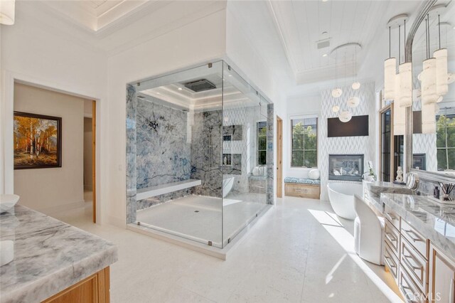 277 Crestview Ave, Camarillo, CA 93010 - bathroom featuring a stall shower, ornamental molding, a freestanding tub, a premium fireplace, and vanity