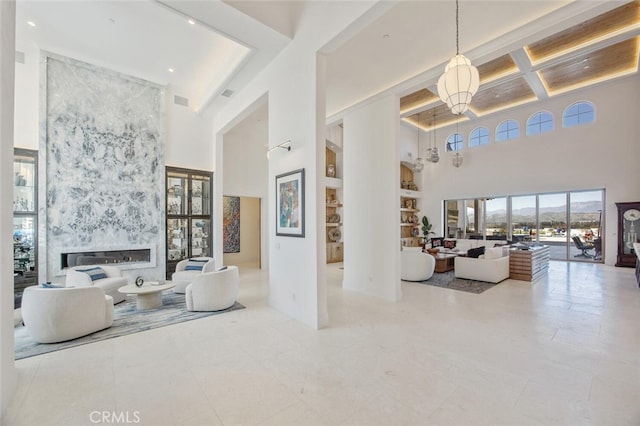 277 Crestview Ave, Camarillo, CA 93010 - living room with a high ceiling, a high end fireplace, beam ceiling, recessed lighting, and coffered ceiling
