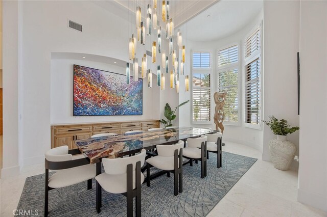 277 Crestview Ave, Camarillo, CA 93010 - dining space featuring a high ceiling and baseboards