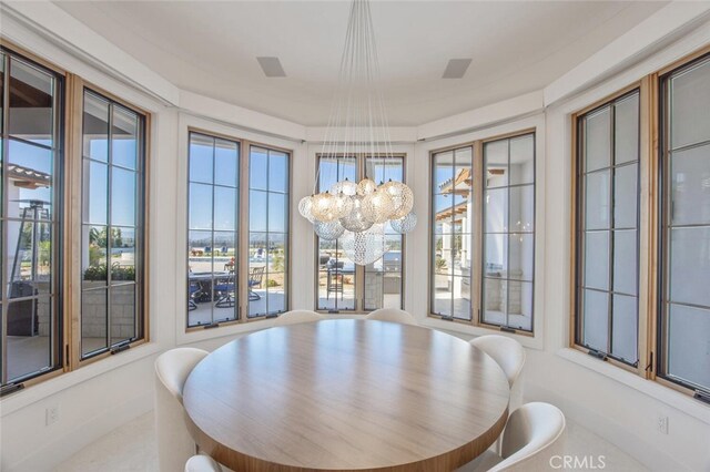 277 Crestview Ave, Camarillo, CA 93010 - dining area with plenty of natural light and a chandelier