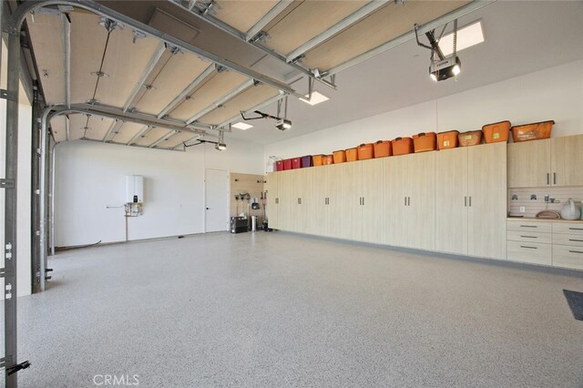 277 Crestview Ave, Camarillo, CA 93010 - garage featuring a garage door opener