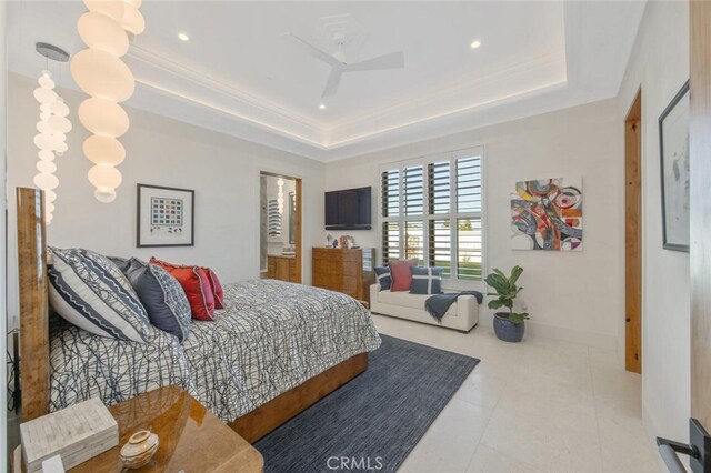 277 Crestview Ave, Camarillo, CA 93010 - tiled bedroom featuring a tray ceiling, recessed lighting, a ceiling fan, baseboards, and connected bathroom