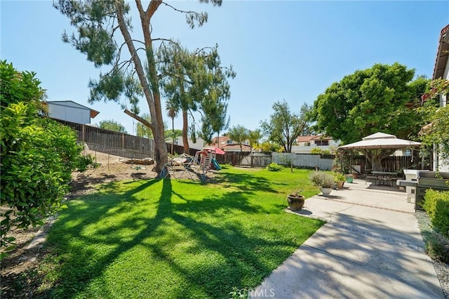 1824 S Starfire Ave, Corona, CA 92879 - view of yard featuring a playground and a patio area