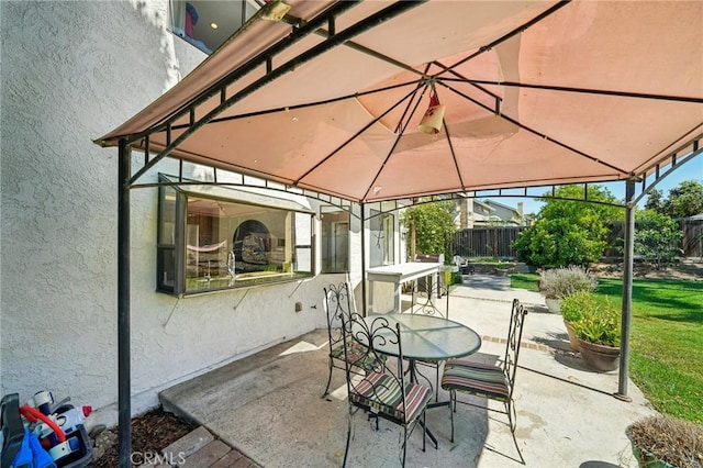 1824 S Starfire Ave, Corona, CA 92879 - view of patio / terrace featuring a gazebo, fence, and outdoor dining space