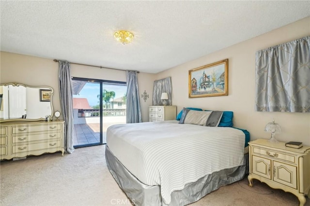 1824 S Starfire Ave, Corona, CA 92879 - bedroom featuring light carpet, access to exterior, and a textured ceiling