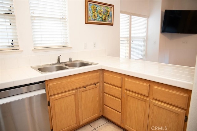 564 Margie Pl, Nipomo, CA 93444 - kitchen with dishwasher, a sink, tile countertops, light tile patterned floors, and a peninsula