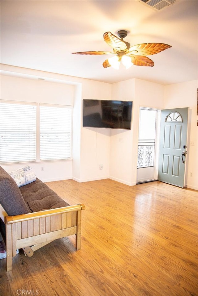 564 Margie Pl, Nipomo, CA 93444 - living room with light wood-style flooring, ceiling fan, and baseboards