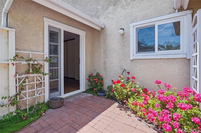 855 Dahlia Ln, San Luis Obispo, CA 93401 - entrance to property featuring stucco siding and a patio area