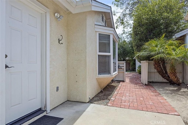 855 Dahlia Ln, San Luis Obispo, CA 93401 - entrance to property featuring stucco siding and a patio