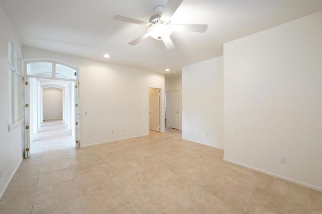 23425 Mountain Peak Rd, Ramona, CA 92065 - empty room featuring recessed lighting, arched walkways, a ceiling fan, light tile patterned flooring, and baseboards
