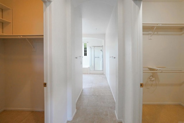 23425 Mountain Peak Rd, Ramona, CA 92065 - spacious closet with light tile patterned floors and arched walkways