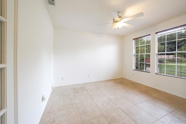 23425 Mountain Peak Rd, Ramona, CA 92065 - spare room with a ceiling fan, light tile patterned flooring, and baseboards