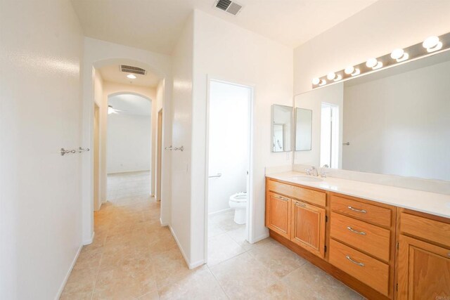 23425 Mountain Peak Rd, Ramona, CA 92065 - bathroom featuring vanity, toilet, tile patterned flooring, and baseboards