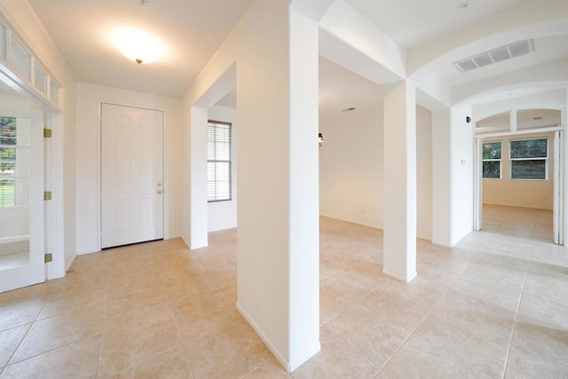 23425 Mountain Peak Rd, Ramona, CA 92065 - entryway featuring light tile patterned floors, arched walkways, and plenty of natural light